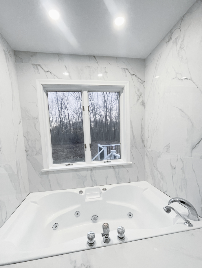 Bathroom tile and fixtures after professional cleaning